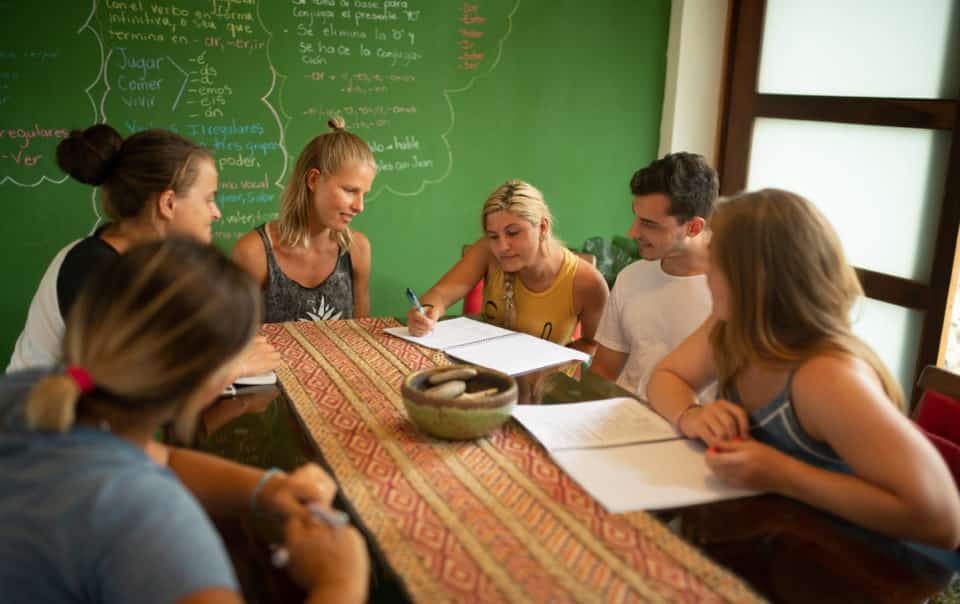 Students reviewing a spanish Lesson at the School of the World