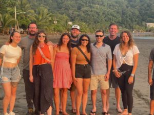 Group photo at sunset in Jaco, Costa Rica